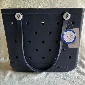 NWT Baby Bag Tote.  Durable, washable, tip-proof.  Comes with one clear insert.